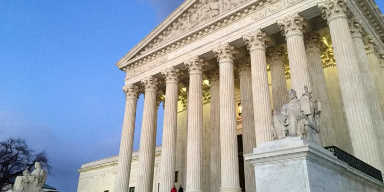 Supreme Court Weighs Fate of Trump Tariffs as Markets Rally