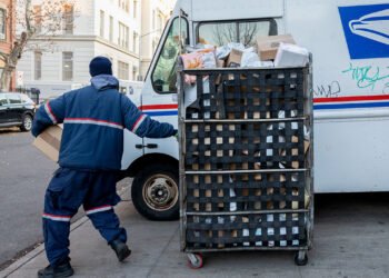 USPS halts pension contributions after warning of looming cash crisis