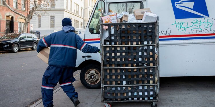 USPS halts pension contributions after warning of looming cash crisis